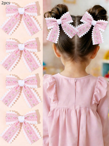 2 pc pink lace bow clips