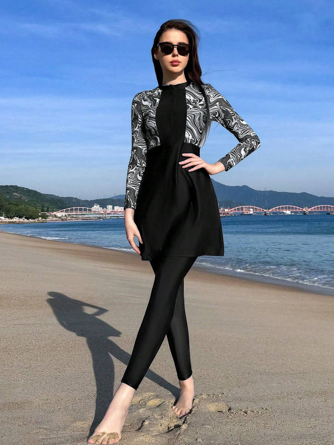 Black and white women’s swim dress