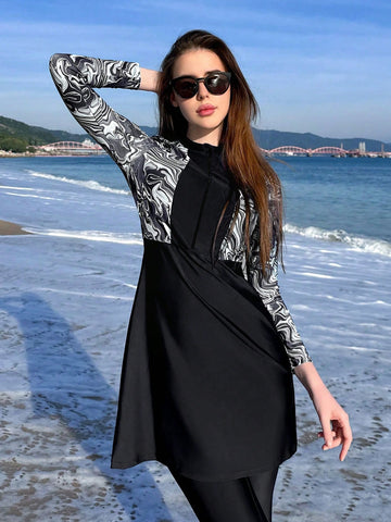 Black and white women’s swim dress