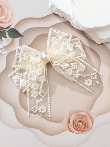Lace bow pearl clip