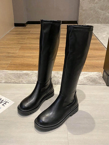 Tall black boots
