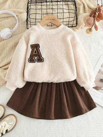 A Fuzzy sweater and skirt set