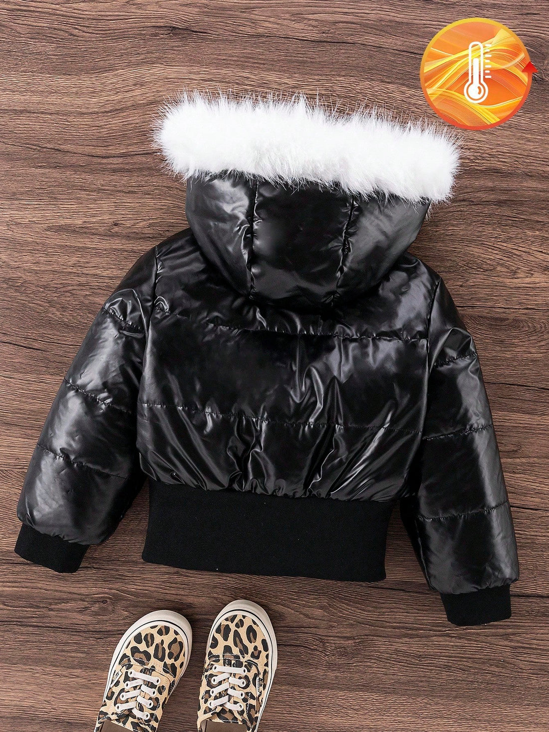 Black puffer with white fur