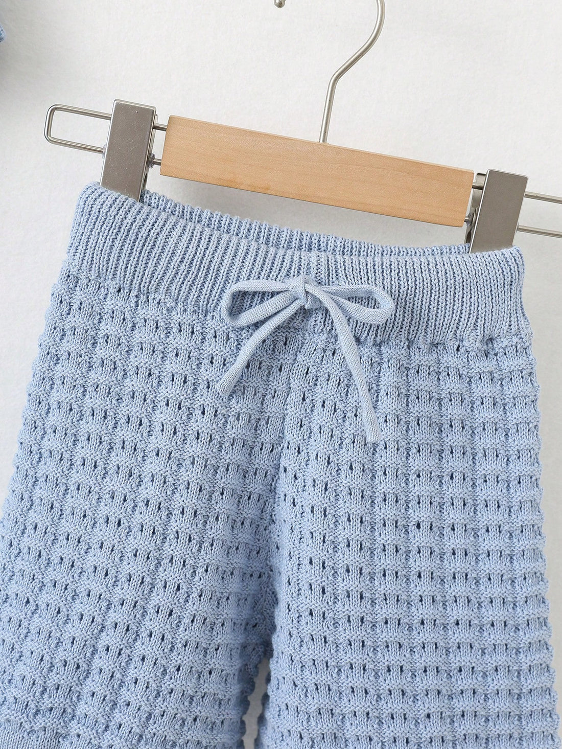 Young boys, blue knit, shirt, and shorts set