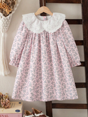Young girls light pink floral dress with collar