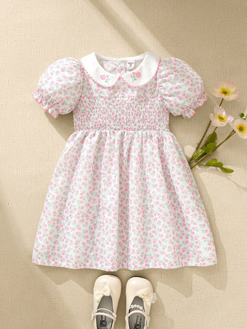 Young girl smocked floral puff sleeve dress