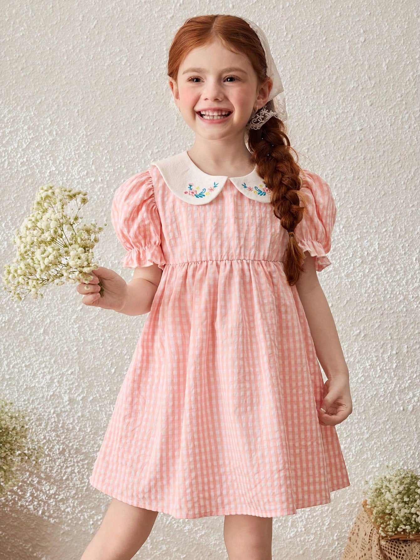 Peach smocked dress with floral collar