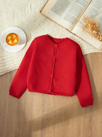 Young girl red Cardigan