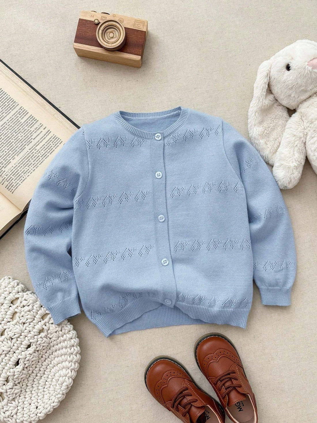 Young girls light blue pointelle cardigan