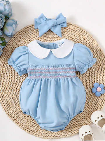 Baby girl blue smocked romper