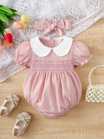 Baby girl pink smocked romper