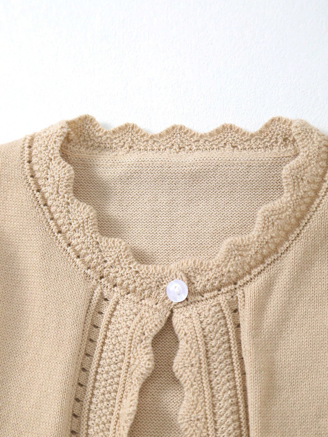 Young girl long sleeve lightweight knit tan cardigan