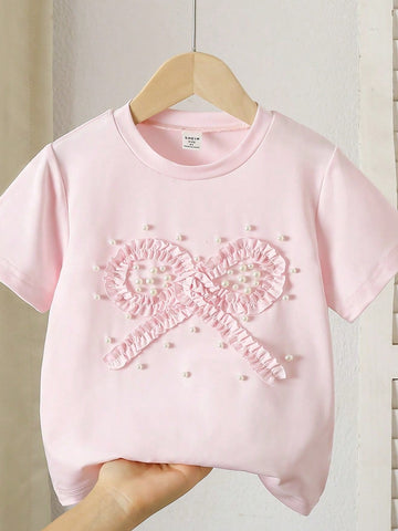 Young girl bow tee