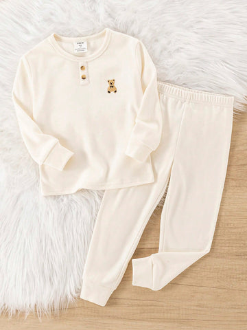 Young boy bear pajamas
